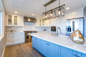 Kitchen with blue and white cabinetry