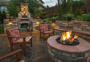 Exterior patio with firepit with fireplace