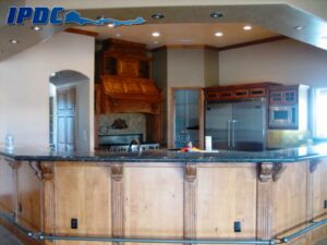 Renovated kitchen bar with black counters