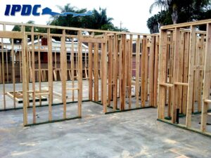 Photograph showing interior framing and rough-in work during a commercial build-out or new construction project.