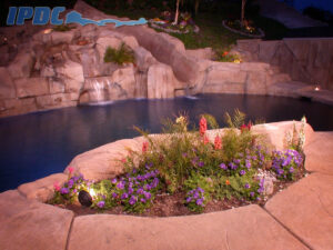 Custom rock formation build around residential swimming pool